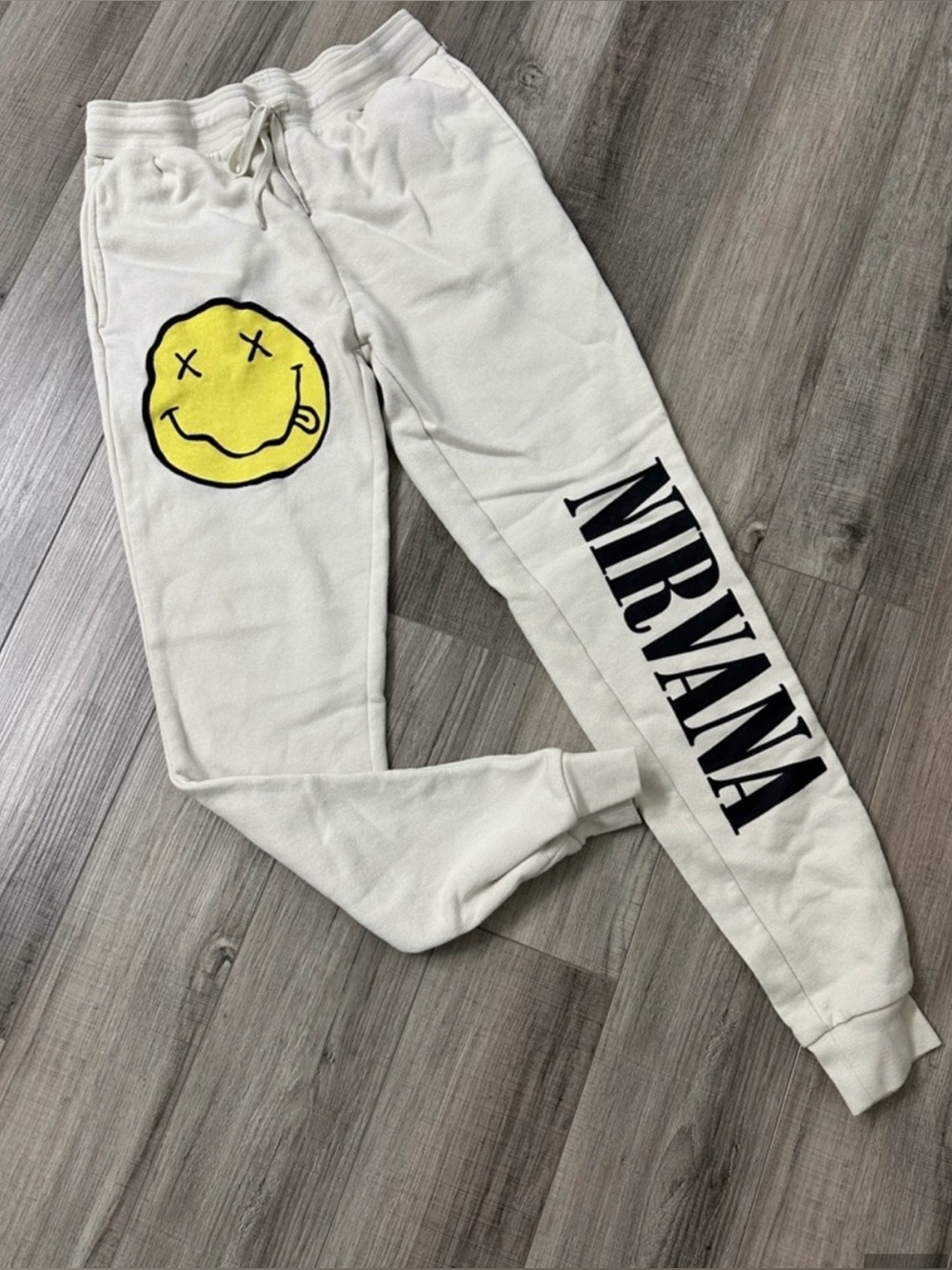 NIRVANA Cream Joggers with Yellow Smiley & Black Logo